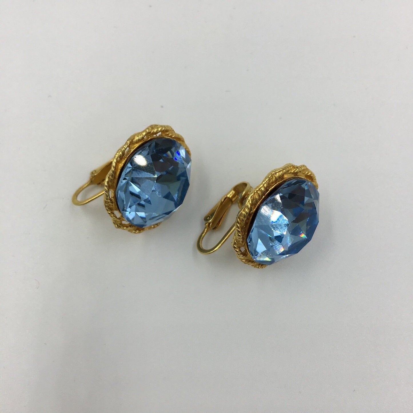 Vintage Vogue Jlry Gold Tone Blue Rhinestone Clip Earrings