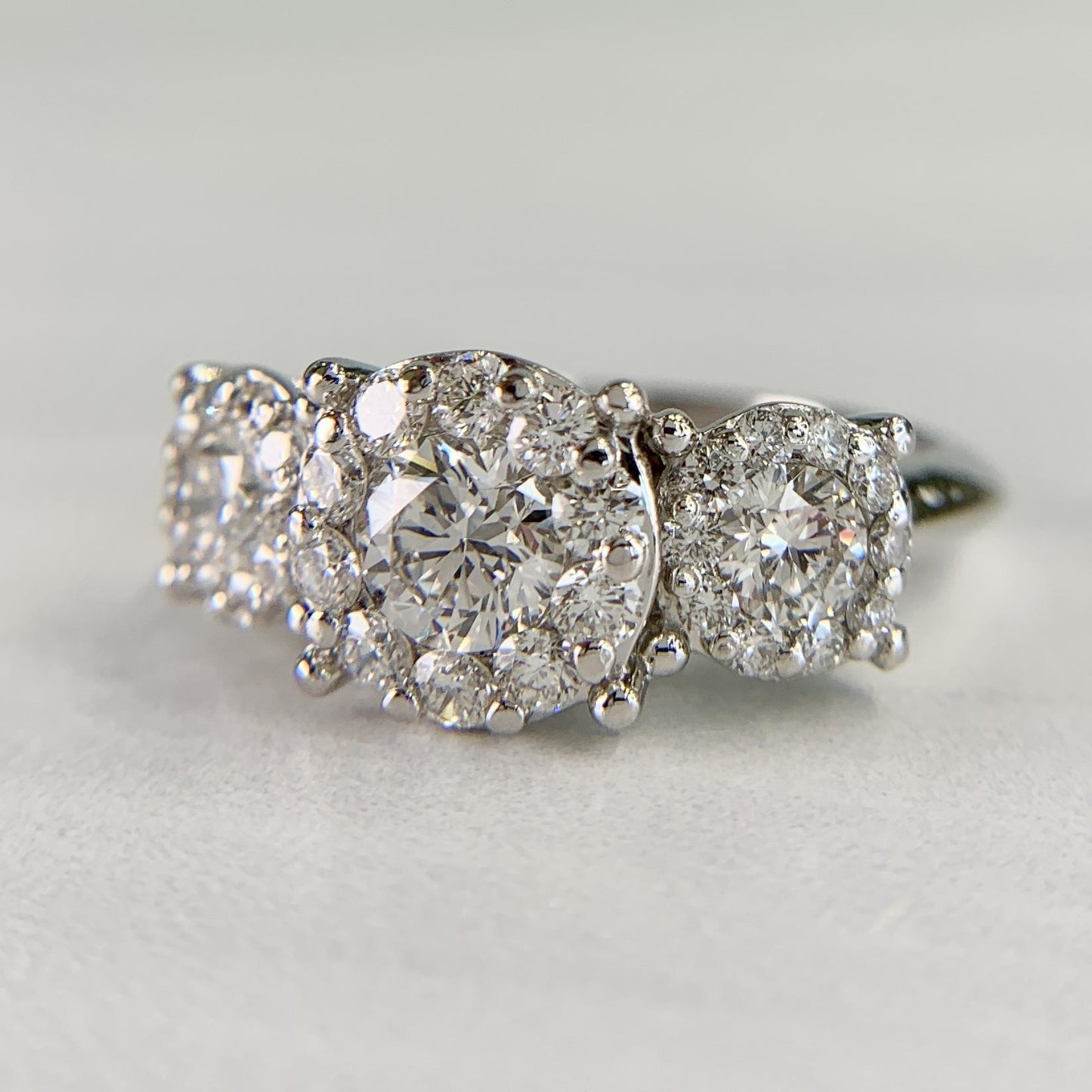 3 Stone Diamond Halo Ring Platinum