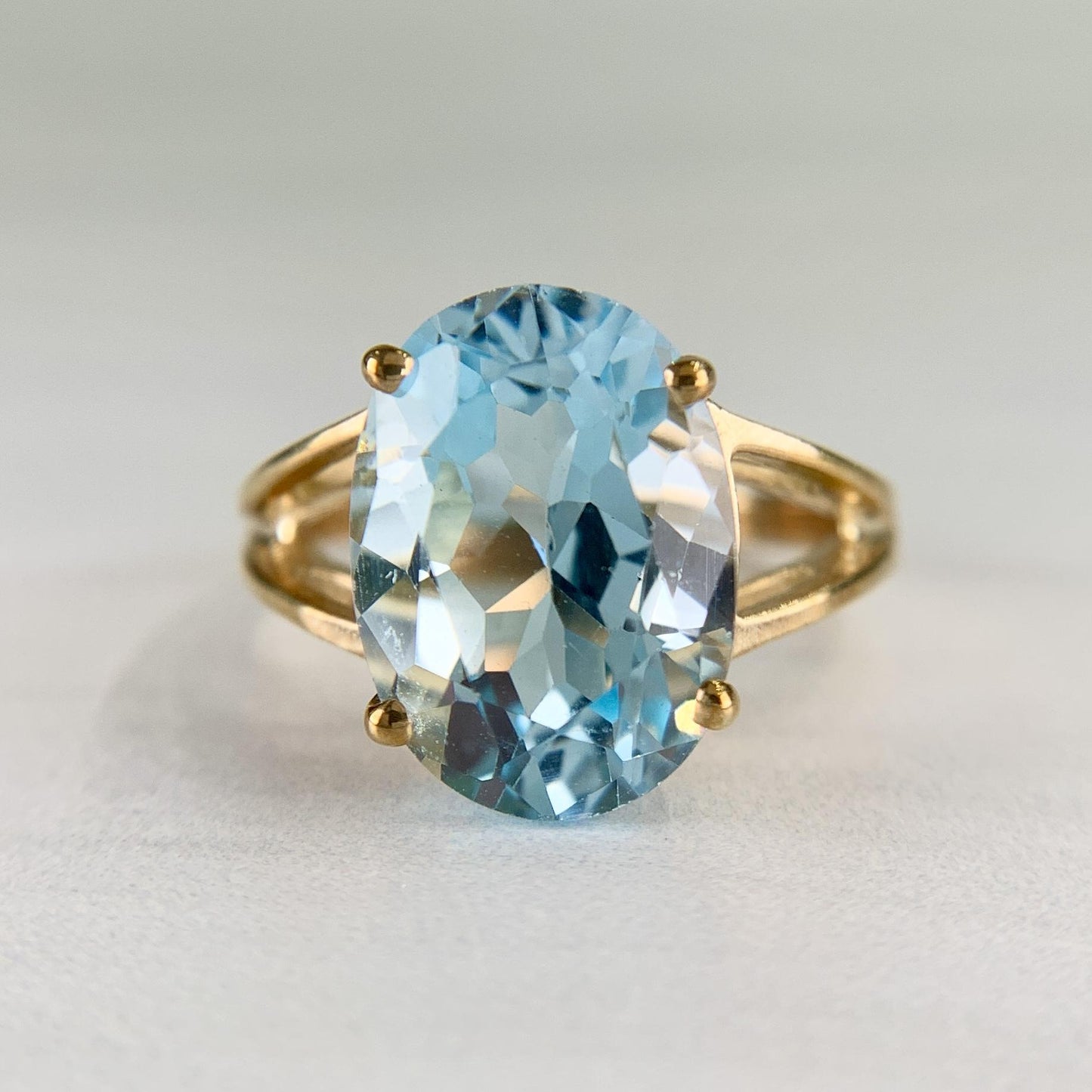 Estate Oval Blue Topaz Split Shank Ring 10k