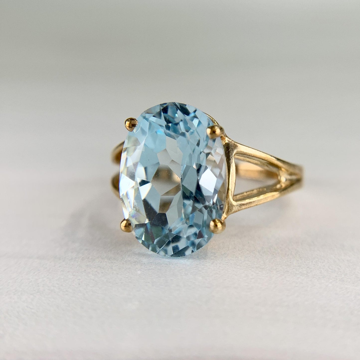 Estate Oval Blue Topaz Split Shank Ring 10k