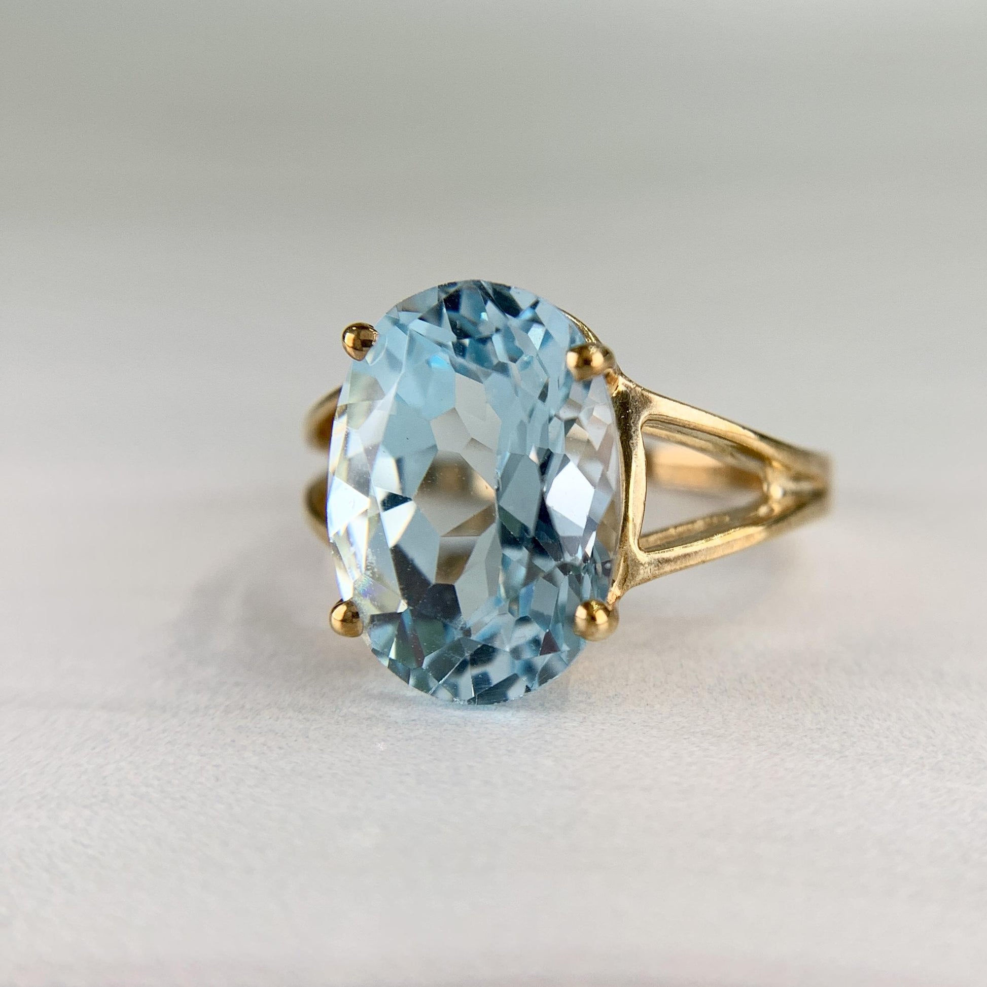 Estate Oval Blue Topaz Split Shank Ring 10k