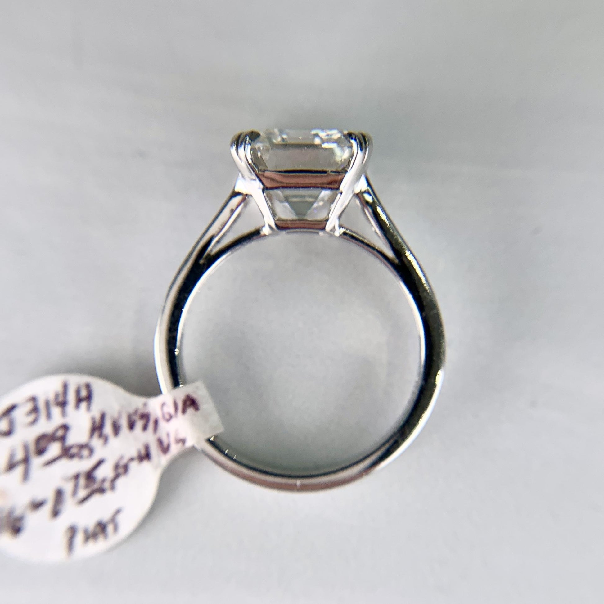 GIA Report Certified 4.09 Emerald Cut Diamond Platinum Engagement Ring
