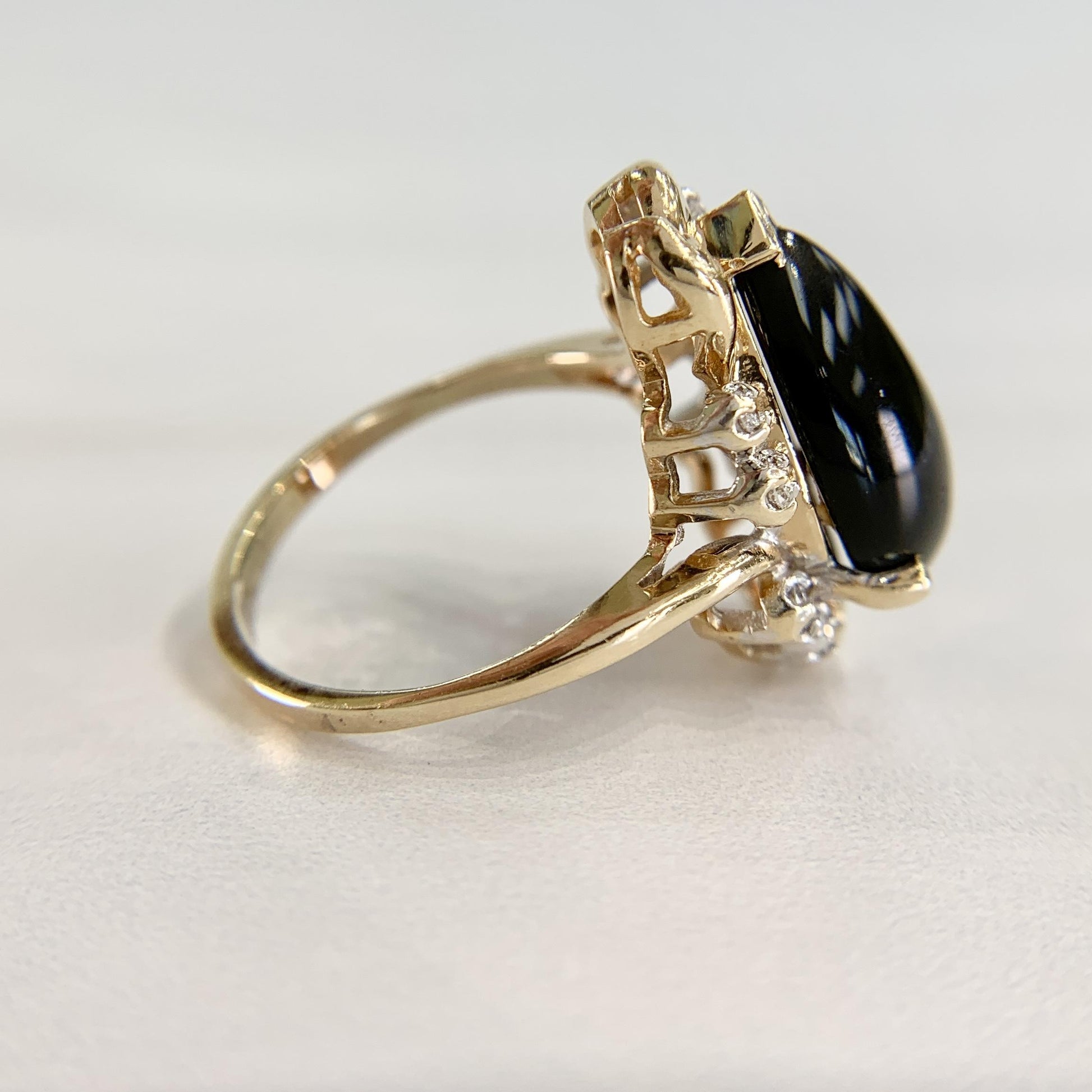 1990's Pear Onyx and Diamond Ring 14k Gold