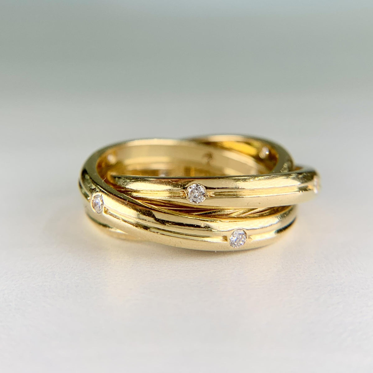 Cartier Constellation Trinity Rolling Band Ring 18k Yellow Gold