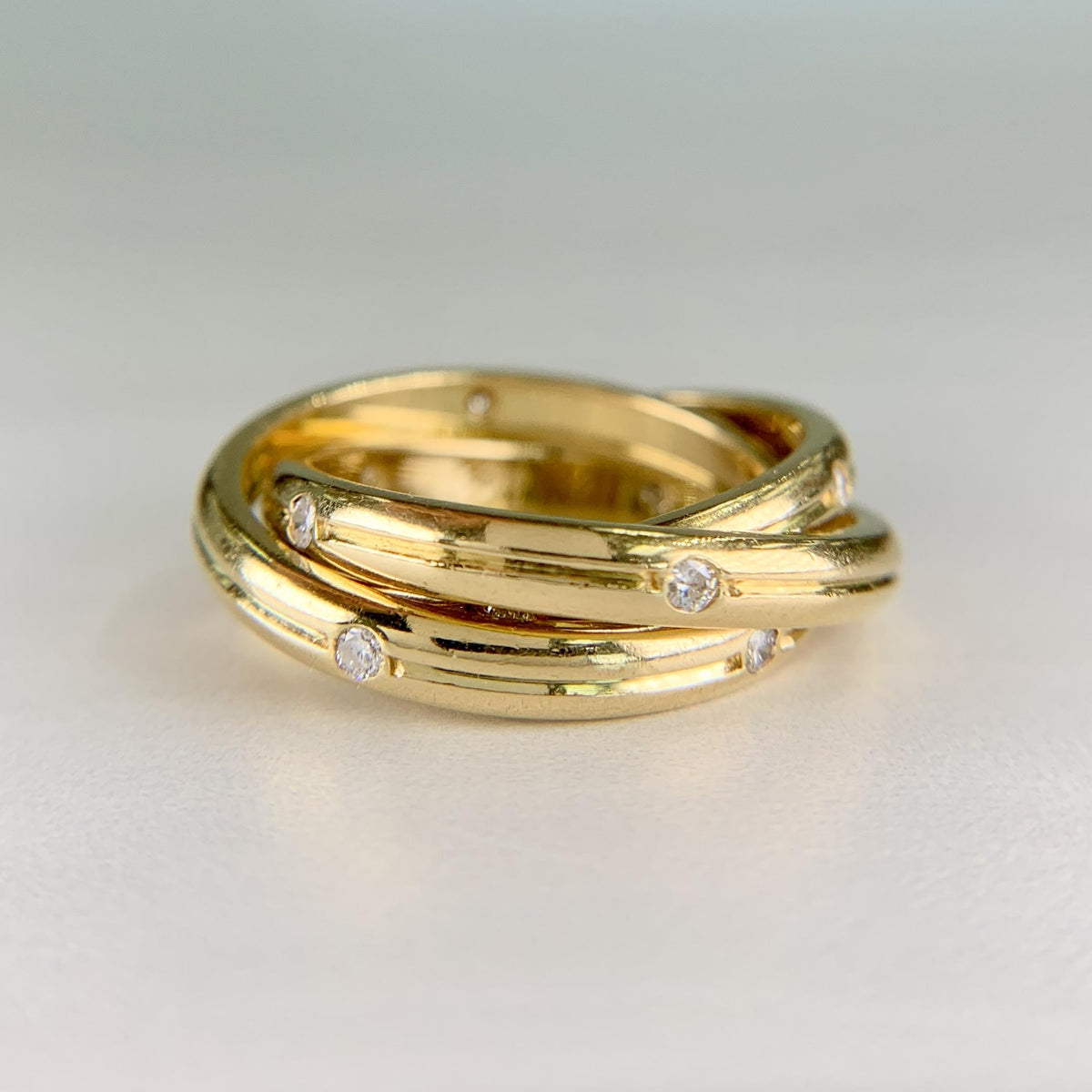 Cartier Constellation Trinity Rolling Band Ring 18k Yellow Gold