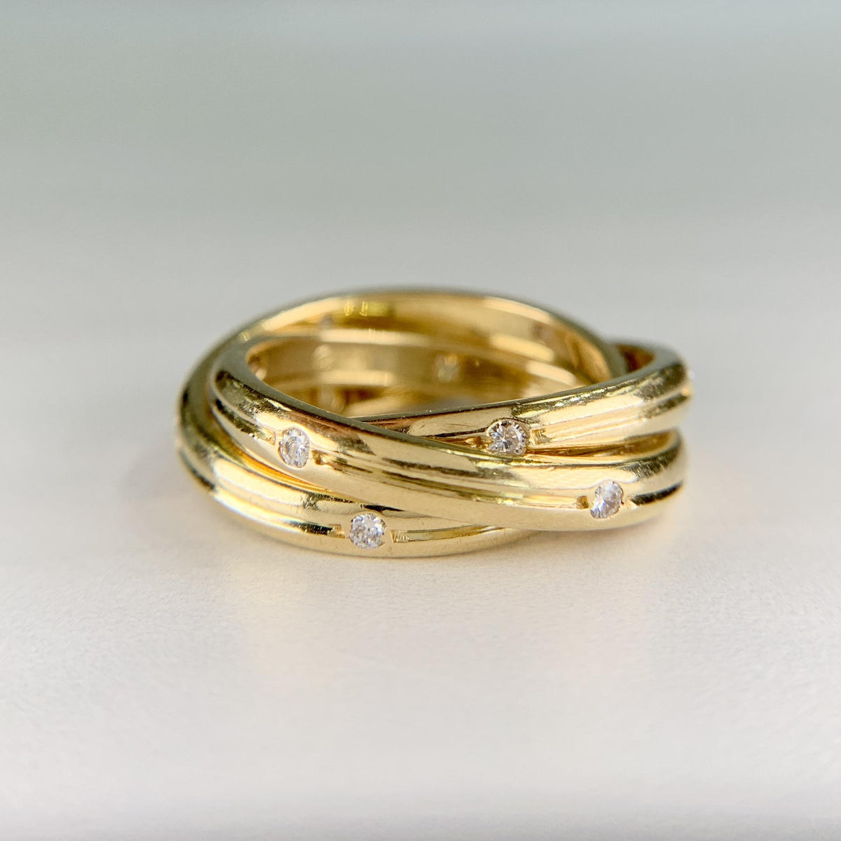 Cartier Constellation Trinity Rolling Band Ring 18k Yellow Gold