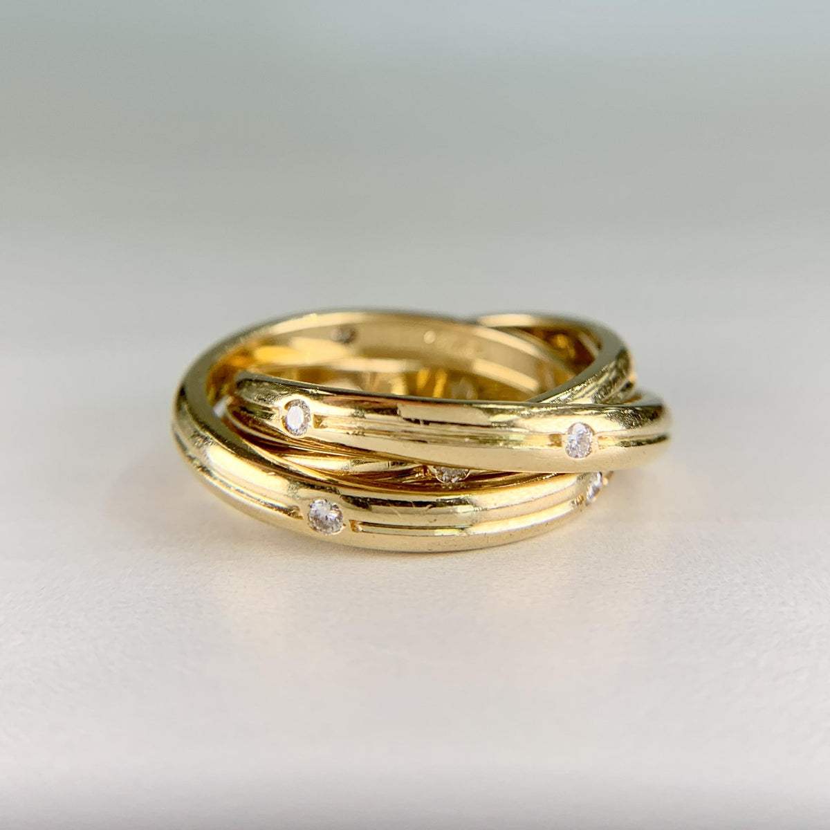Cartier Constellation Trinity Rolling Band Ring 18k Yellow Gold