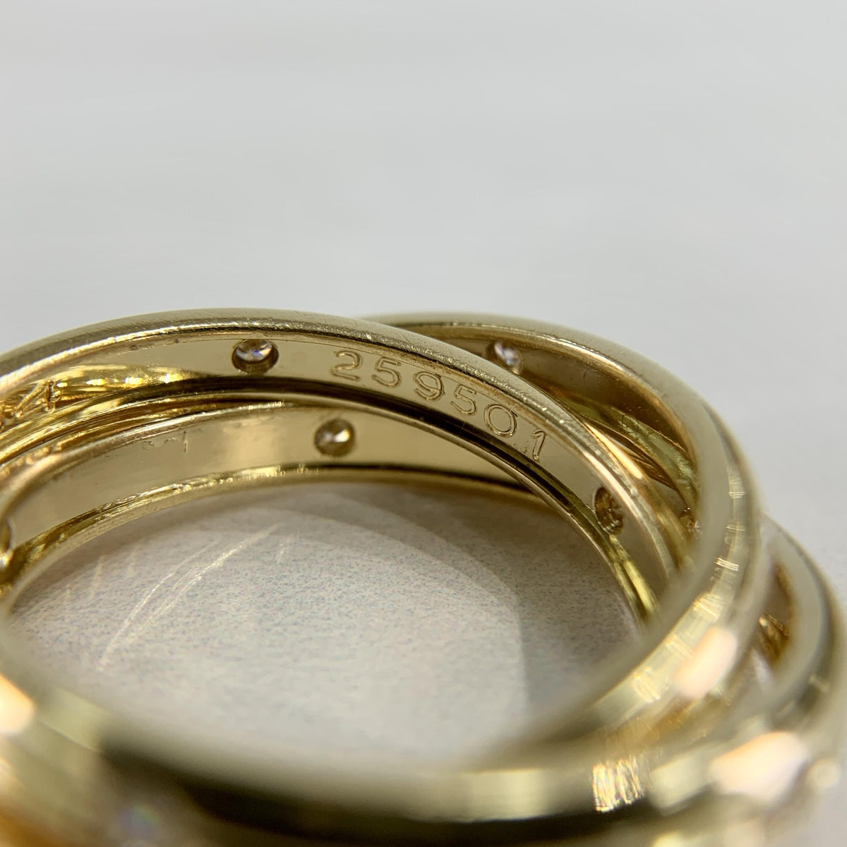Cartier Constellation Trinity Rolling Band Ring 18k Yellow Gold