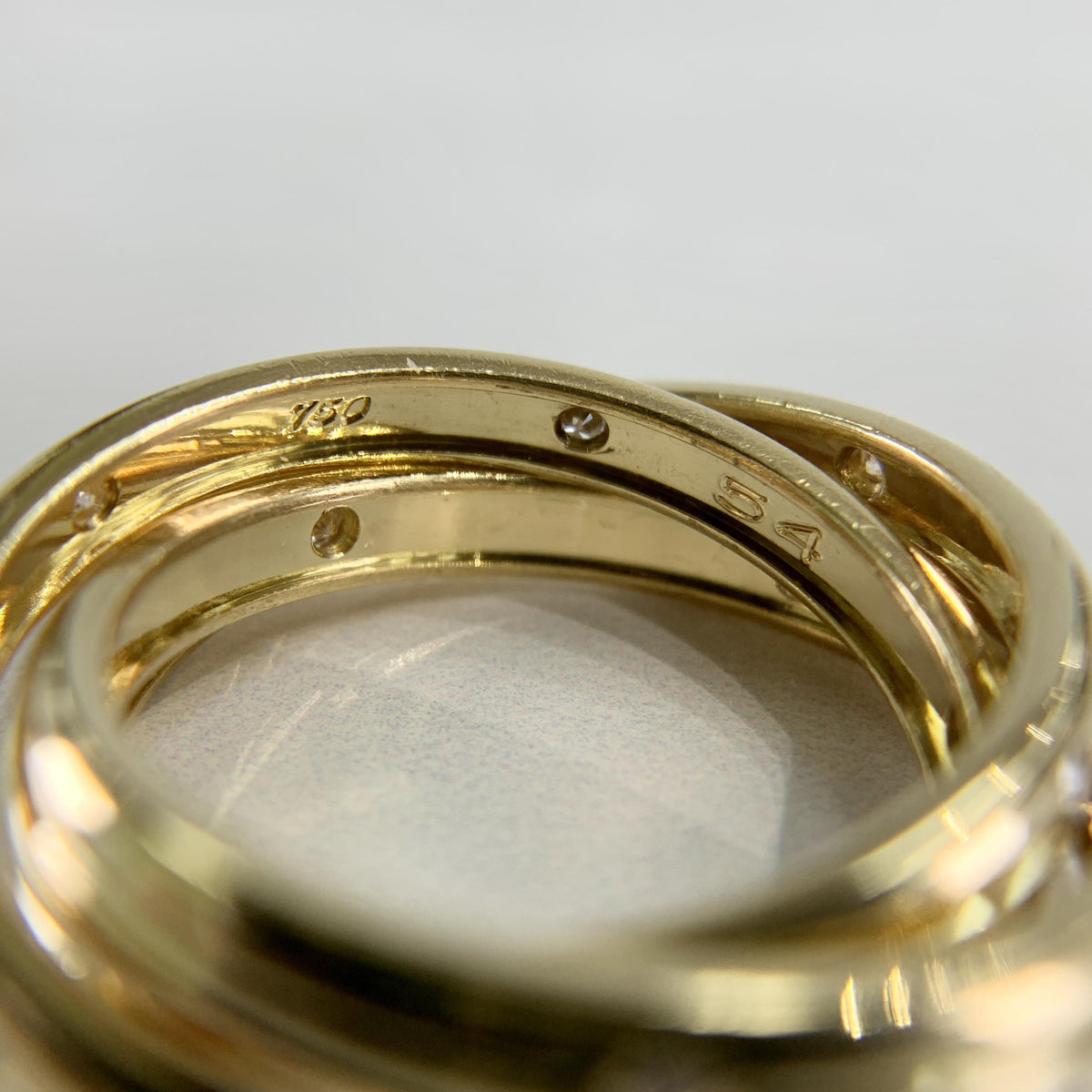 Cartier Constellation Trinity Rolling Band Ring 18k Yellow Gold