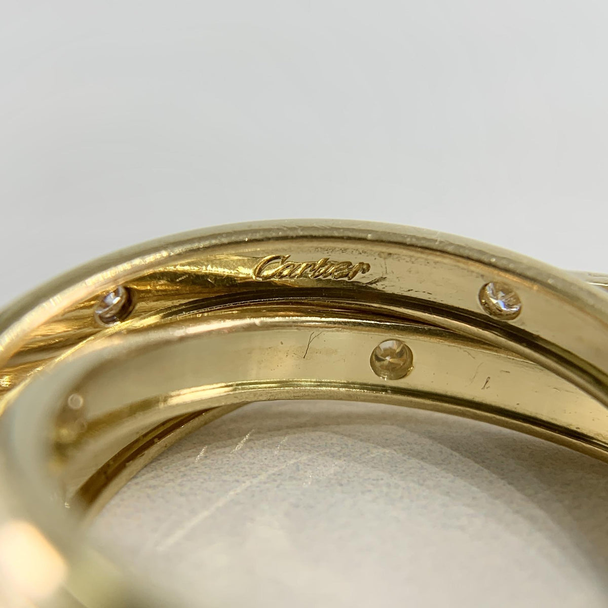 Cartier Constellation Trinity Rolling Band Ring 18k Yellow Gold