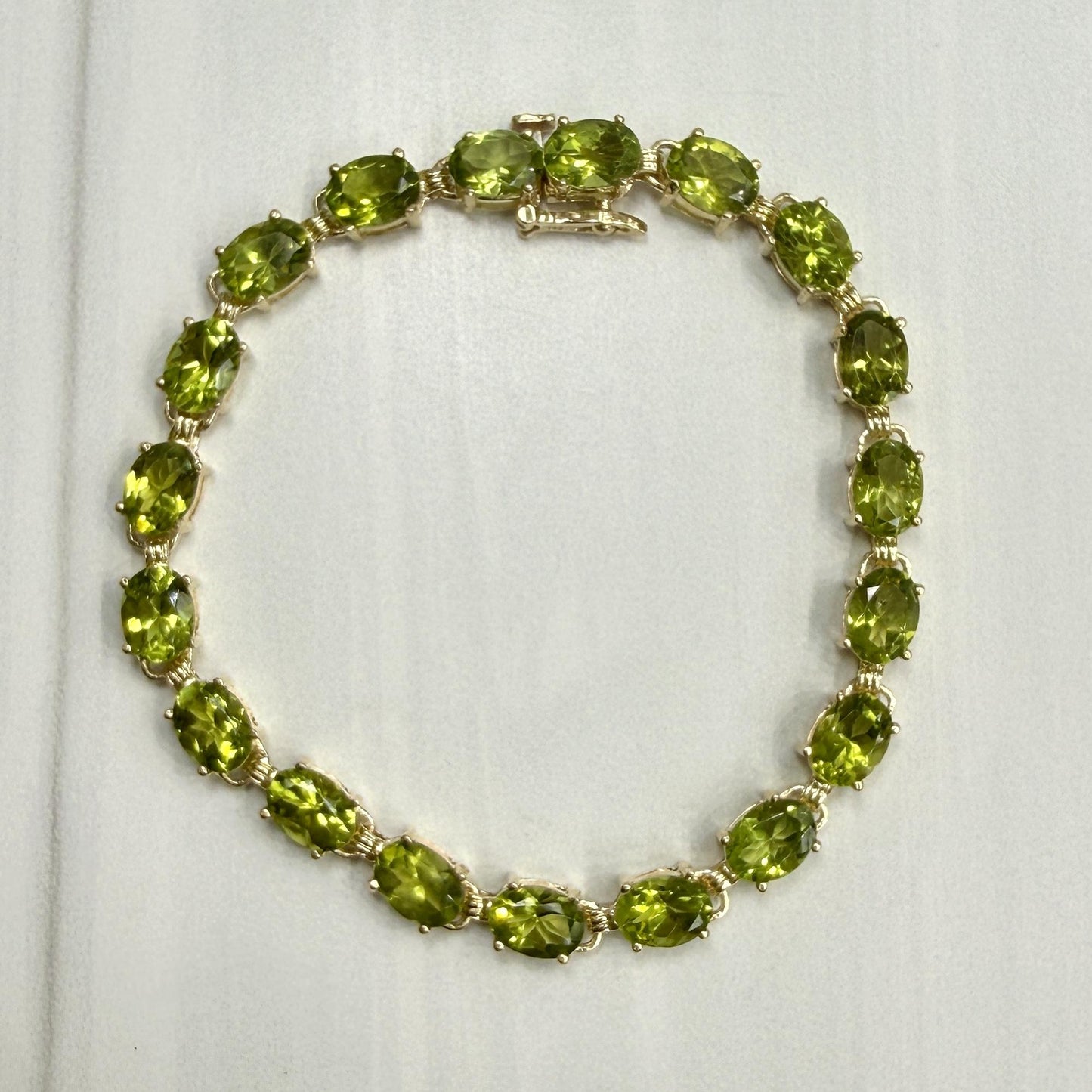 Oval Peridot Tennis Bracelet 14k Yellow Gold