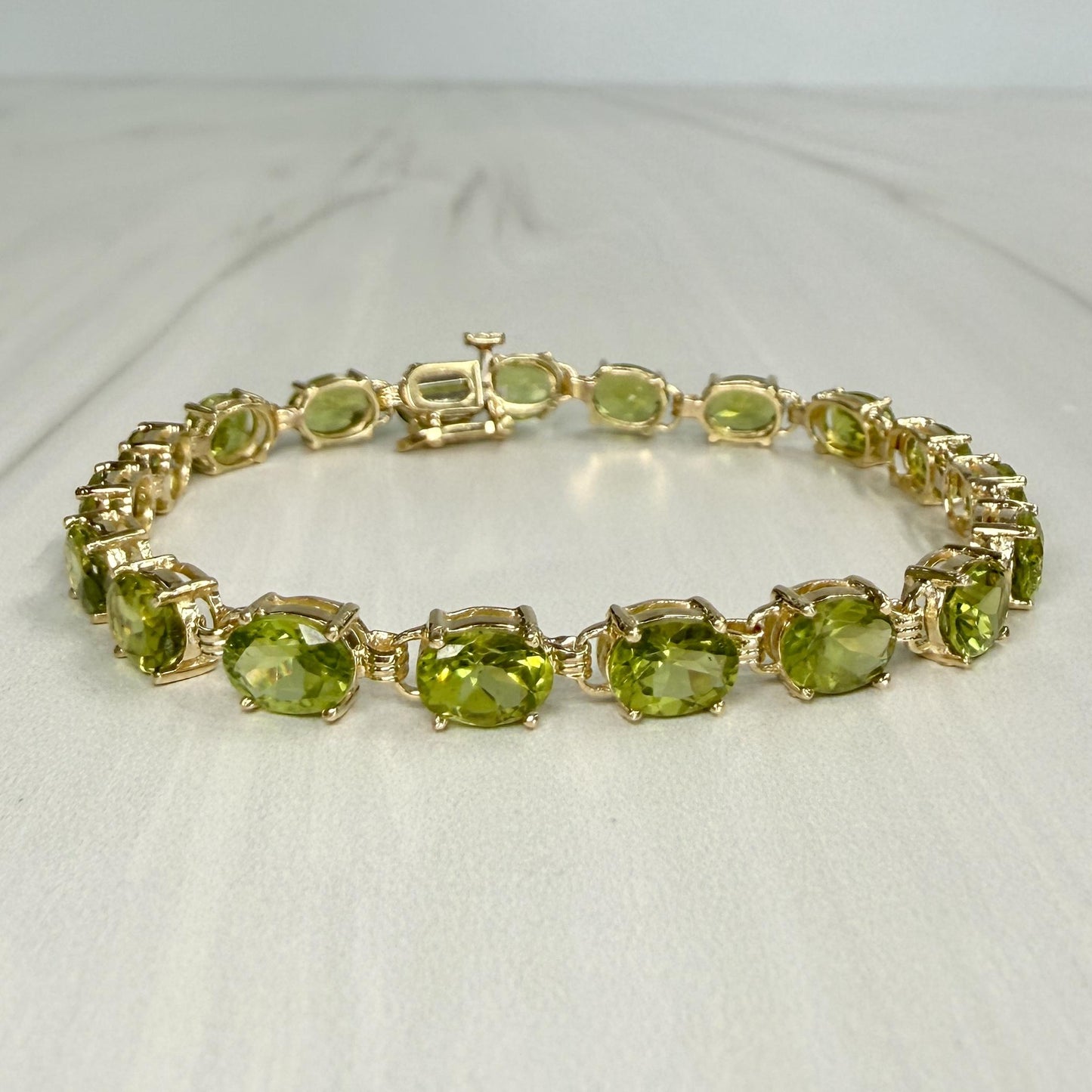 Oval Peridot Tennis Bracelet 14k Yellow Gold