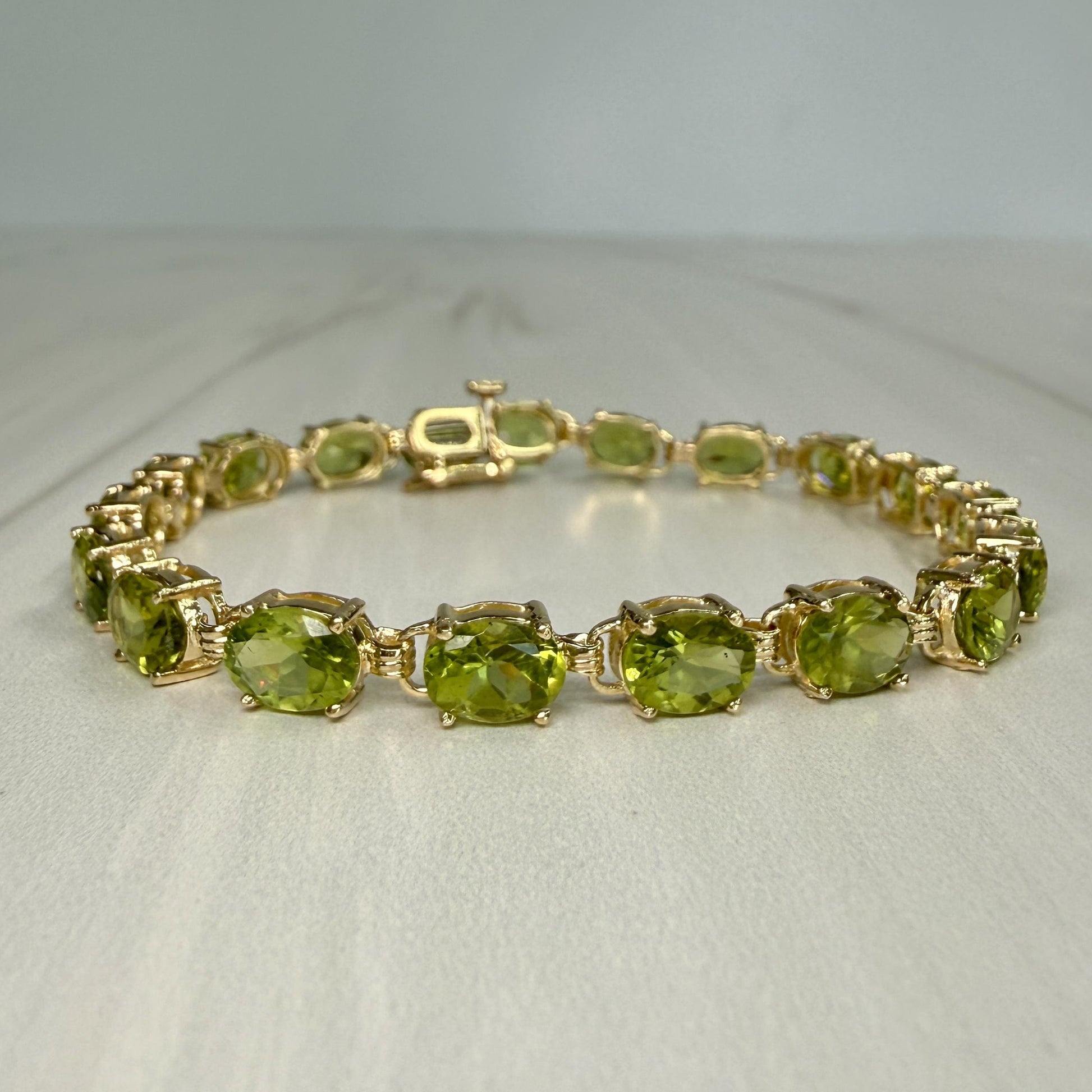 Oval Peridot Tennis Bracelet 14k Yellow Gold