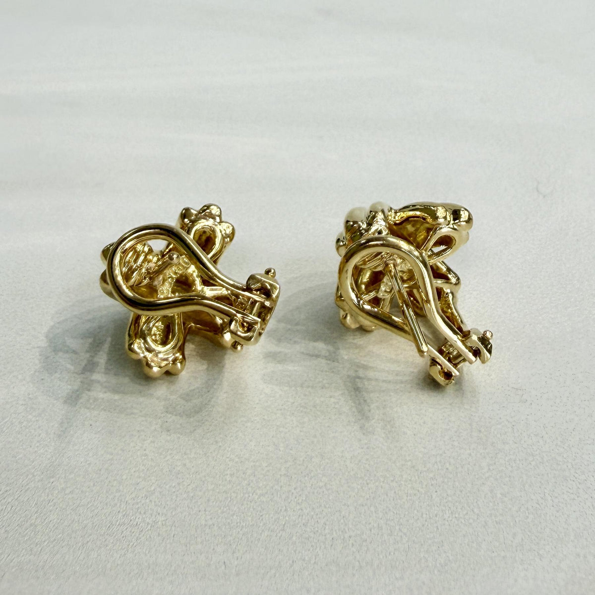 Circa 1990's Tiffany & Co. Signature Small "X" Earrings 18k Yellow Gold