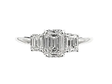 Princess cut diamond three-stone platinum ring, ca 1990s