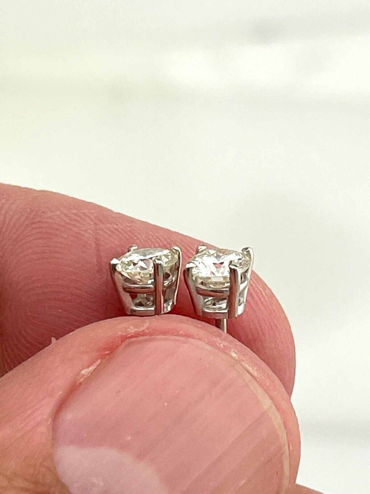 Diamond stud Earrings VVS K .66ct 14k white gold